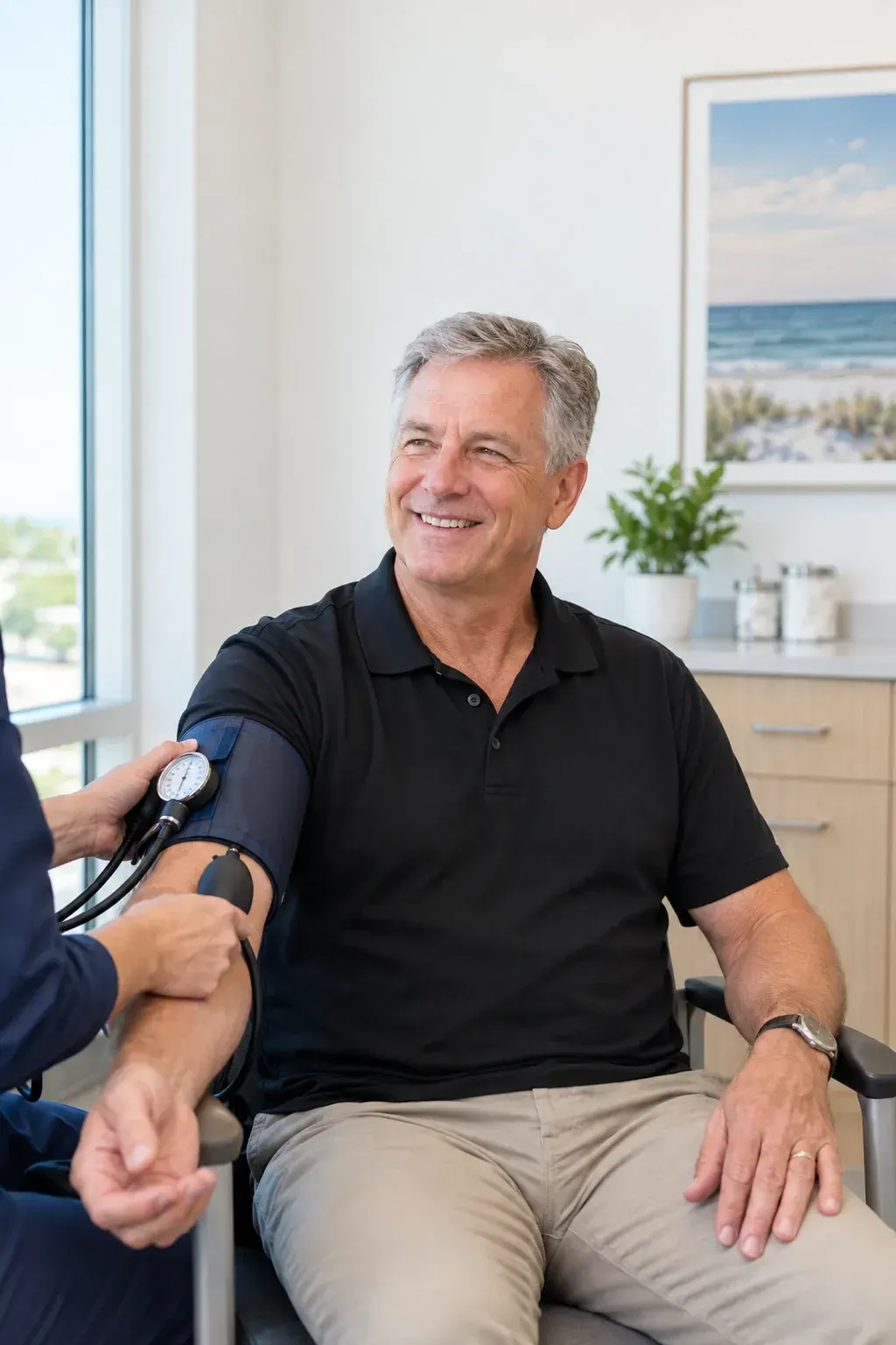 Physician and patient discussing low testosterone symptoms and lab testing at Ready Pain Management in Gulf Breeze, FL